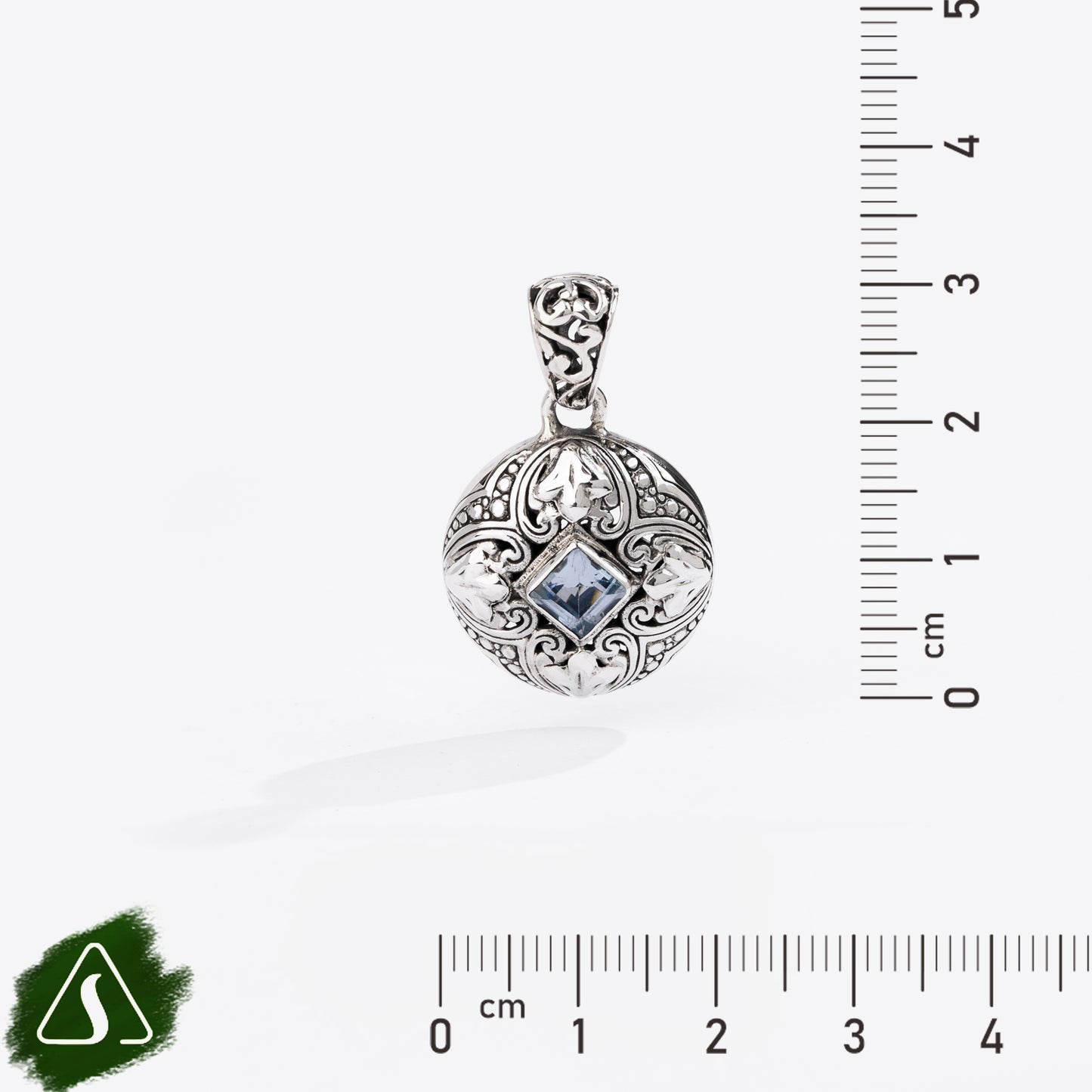 Sterling Silver Round Pendant with Princess-Cut Blue Topaz and Ornate Filigree Design