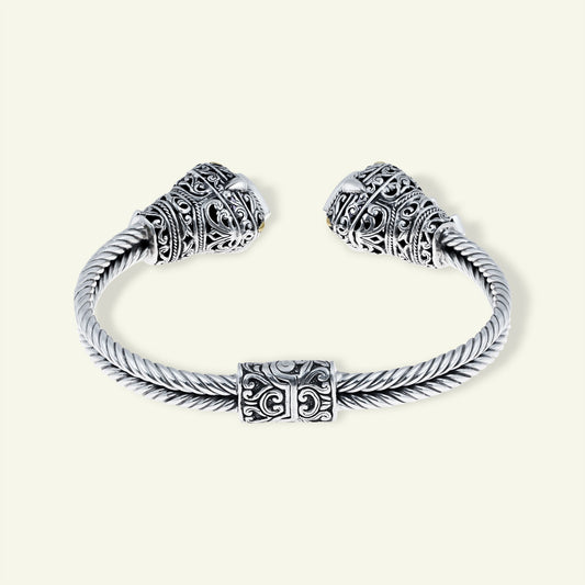 Crown of Clarity: Sterling Silver Cuff with Sky Blue Topaz