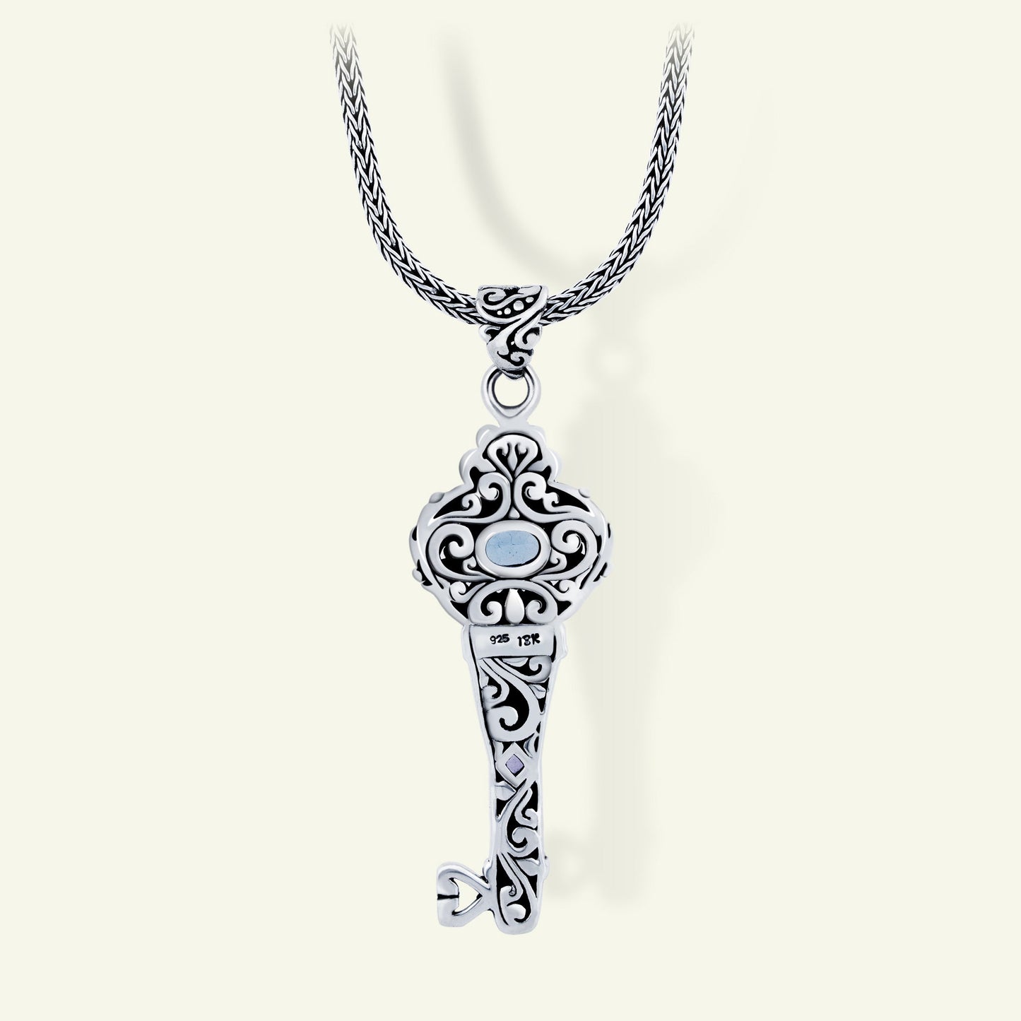 Sterling Silver Key Pendant with Blue Topaz