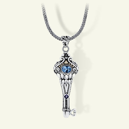 Sterling Silver Key Pendant with Blue Topaz