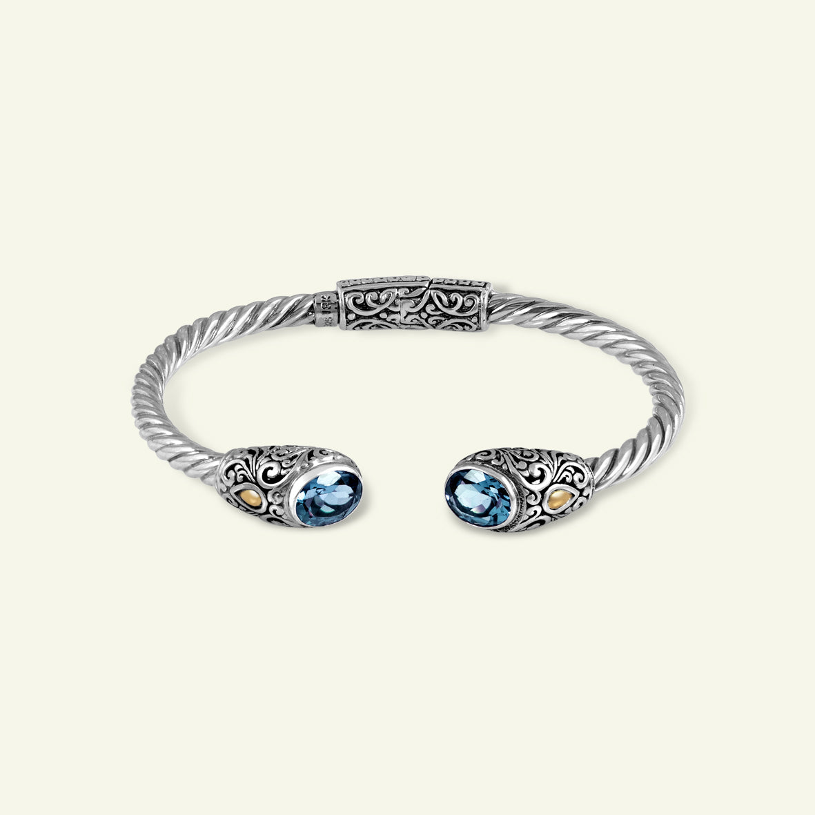 Artisan Twisted Silver Cuff Bracelet with Sculpted Ornamental Ends