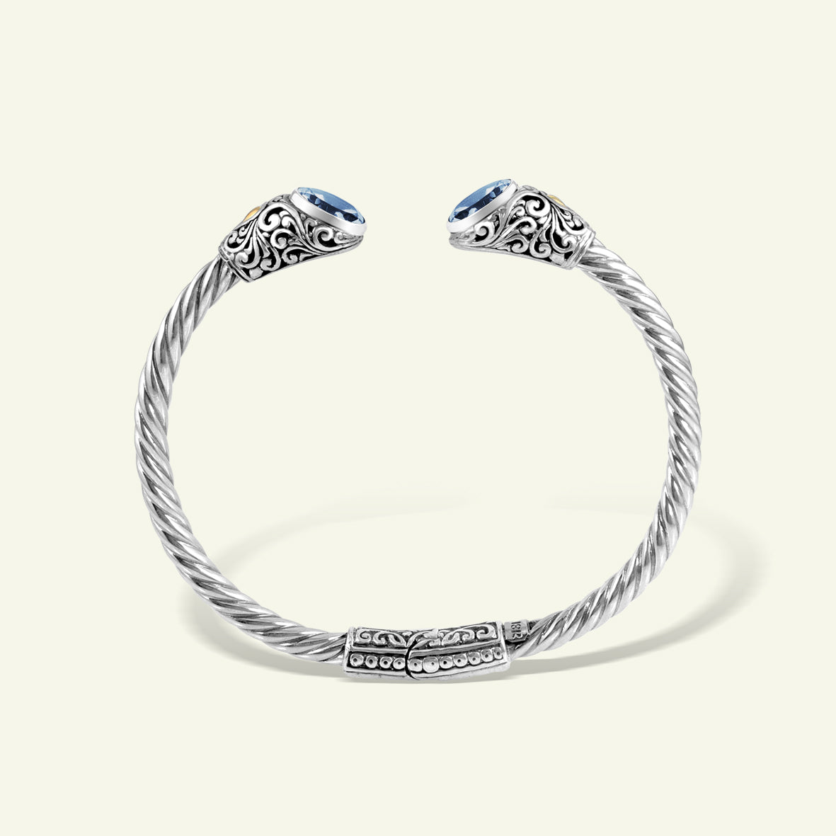 Artisan Twisted Silver Cuff Bracelet with Sculpted Ornamental Ends