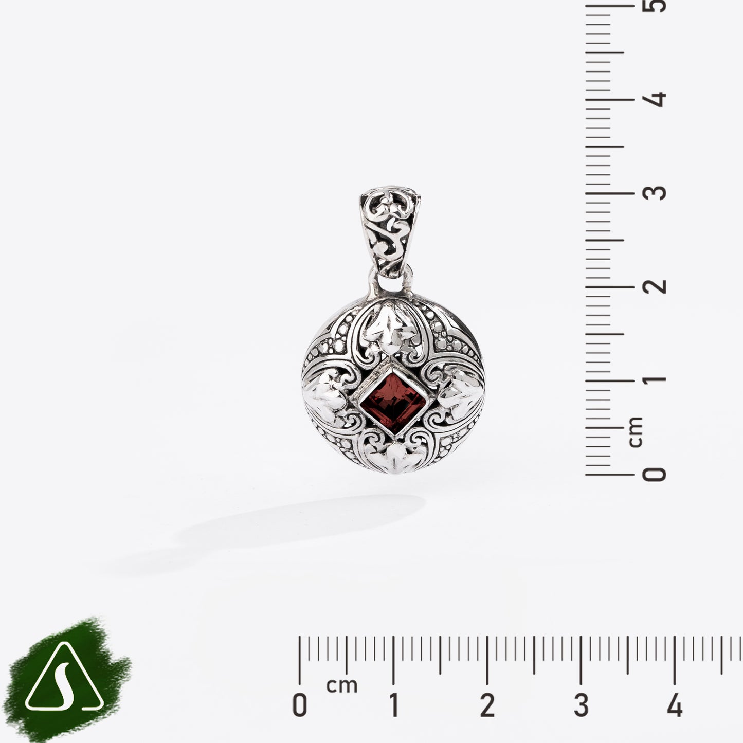 Sterling Silver Round Pendant with Princess-Cut Garnet and Ornate Filigree Design