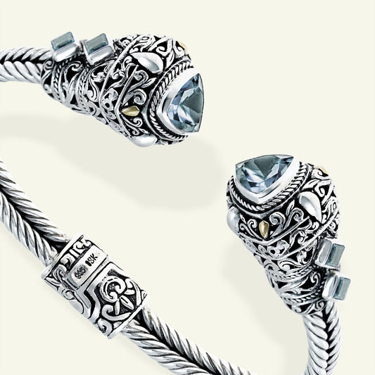 Crown of Clarity: Sterling Silver Cuff with Sky Blue Topaz