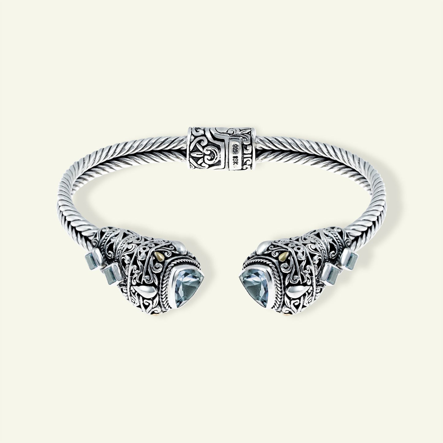 Crown of Clarity: Sterling Silver Cuff with Sky Blue Topaz