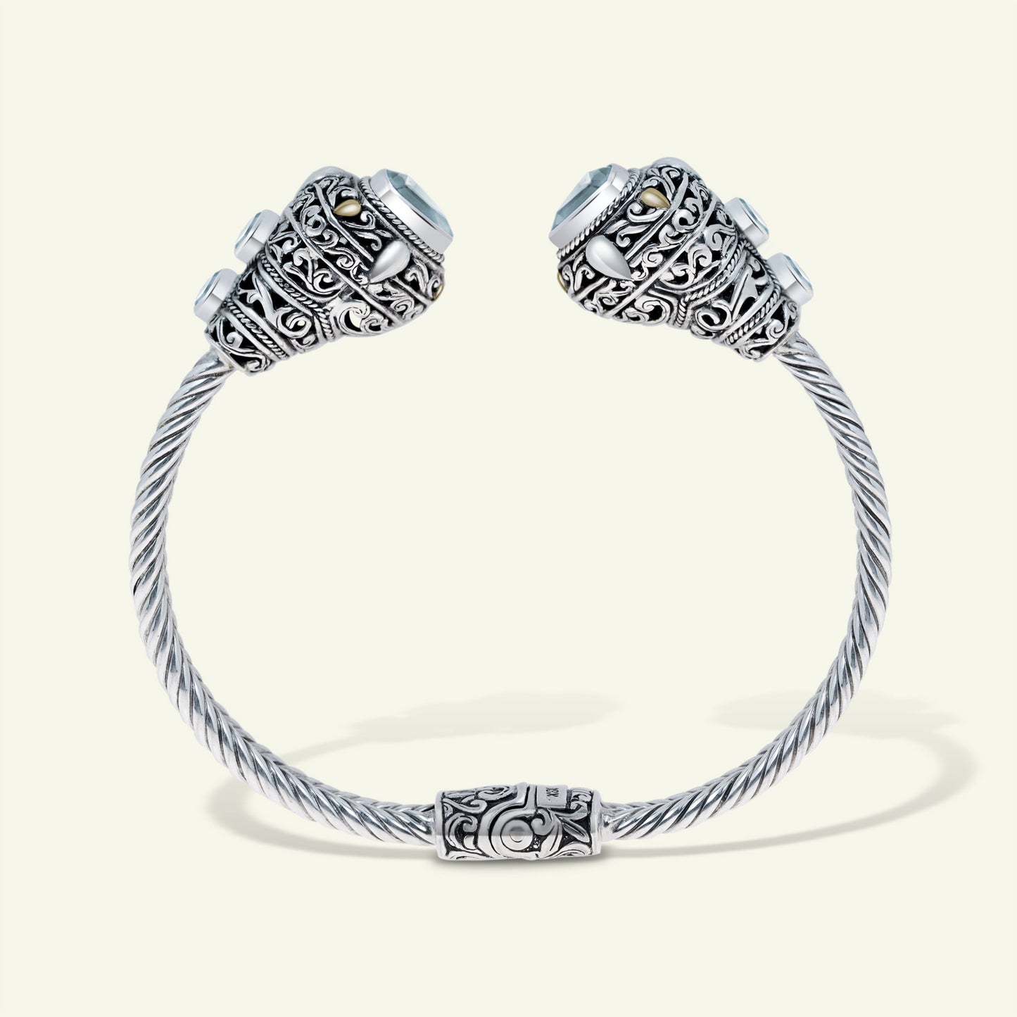 Crown of Clarity: Sterling Silver Cuff with Sky Blue Topaz