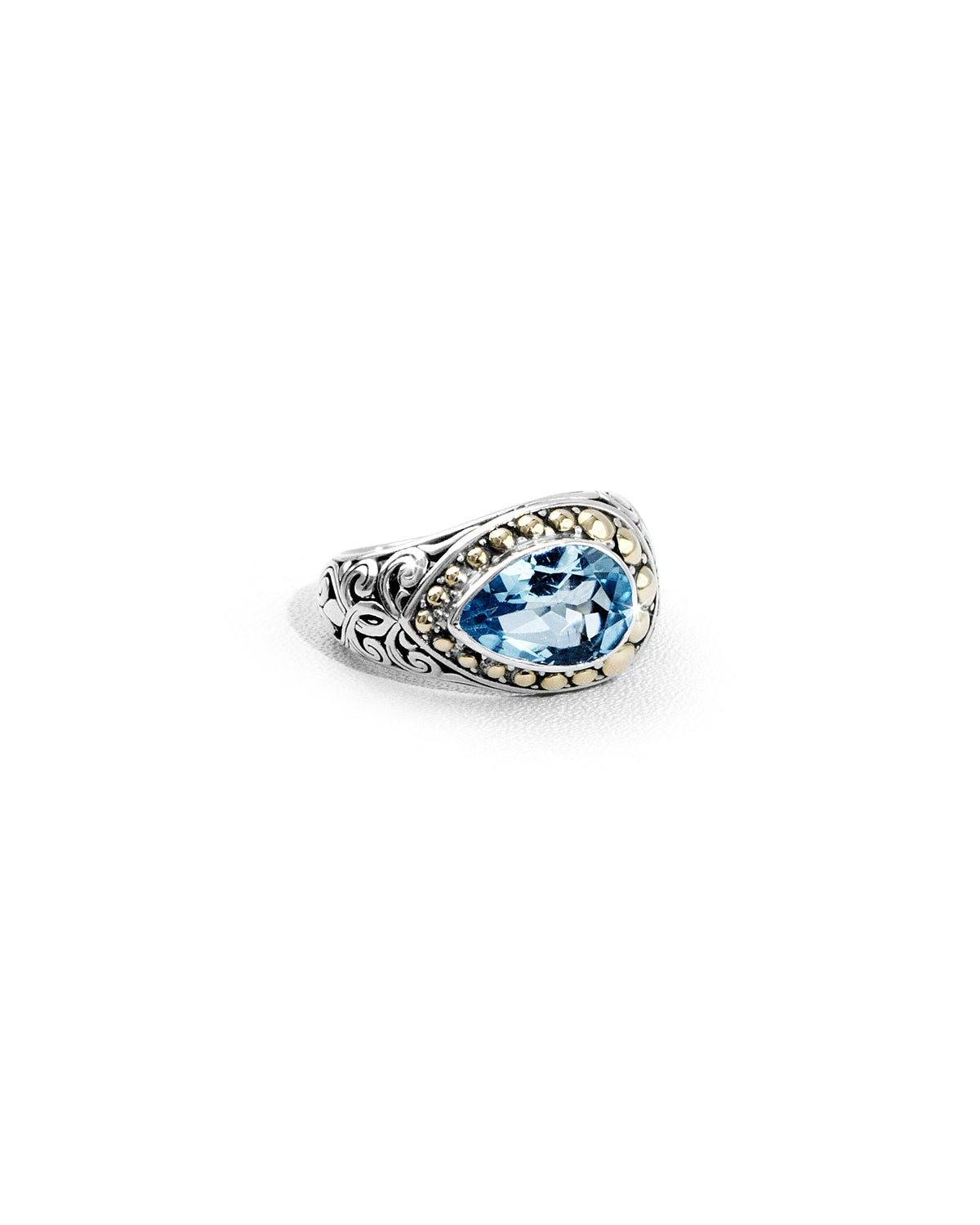 Balinese Oval Blue Topaz Ring with 18K Gold Bead Halo & Leaf Scroll Carving