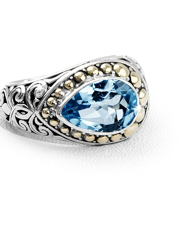 Balinese Oval Blue Topaz Ring with 18K Gold Bead Halo & Leaf Scroll Carving