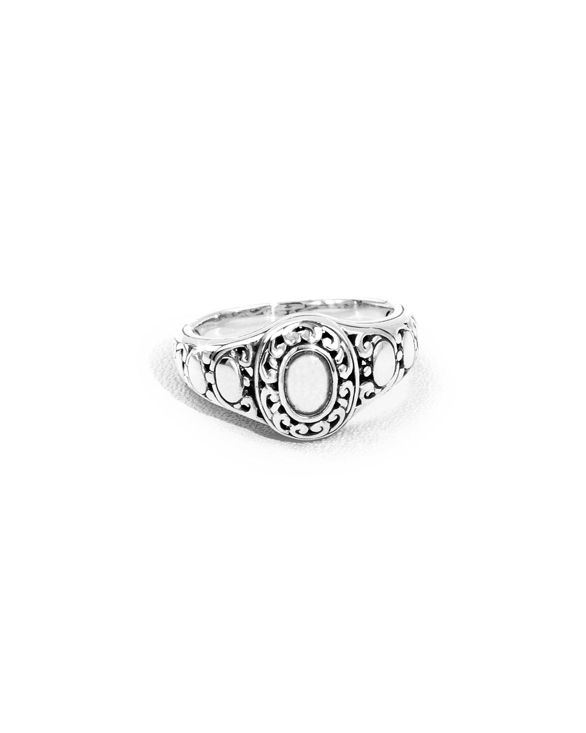 Ornate Balinese Silver Ring with Oval Center and Scrollwork
