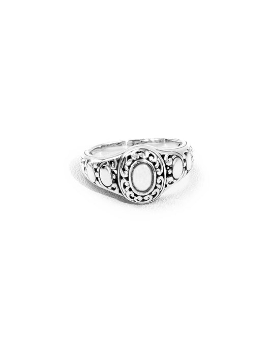 Ornate Balinese Silver Ring with Oval Center and Scrollwork